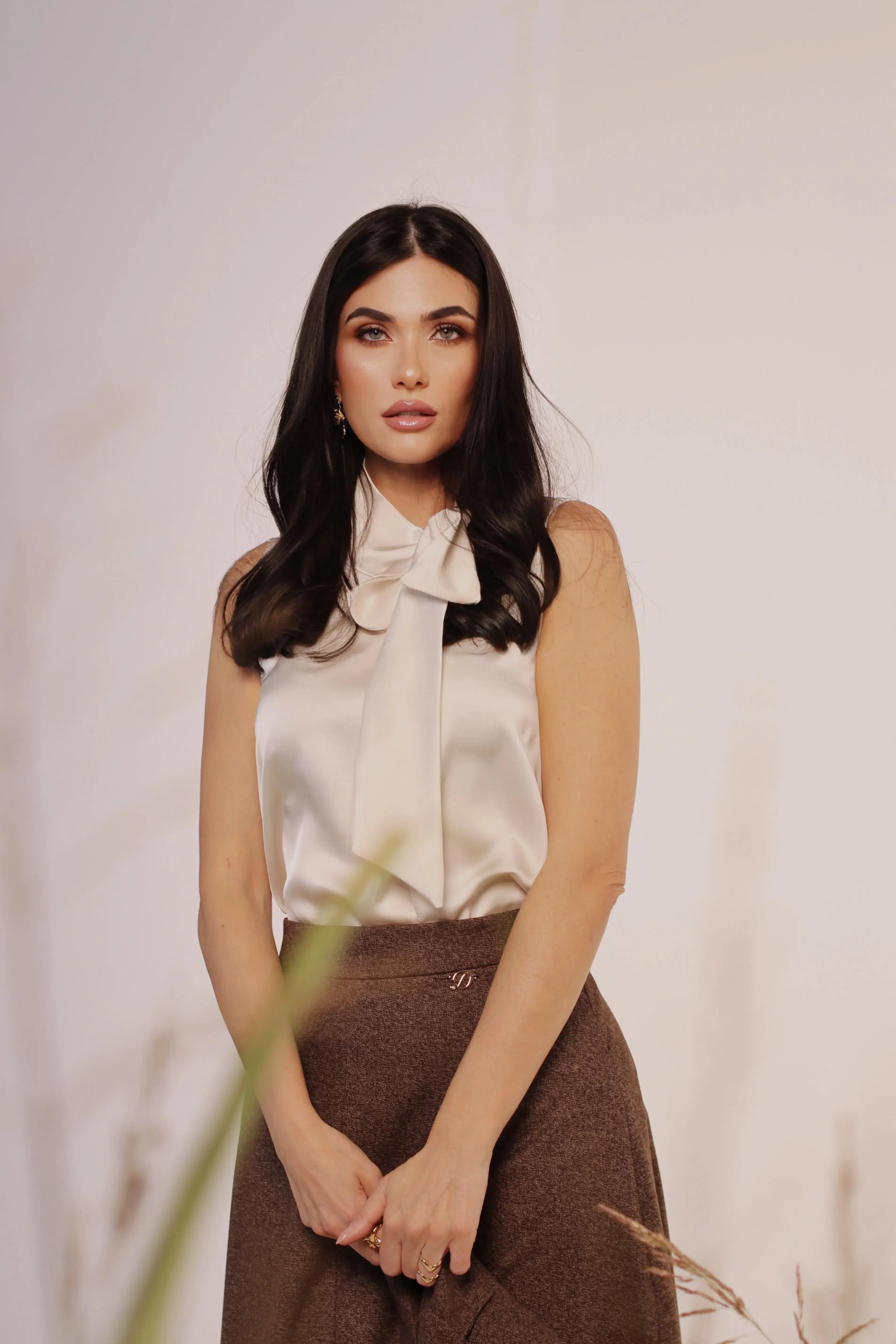 Blusa con fiocco al collo